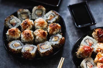 Set of Japanese sushi roll on dark background
