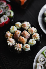 Set of Japanese sushi roll on dark background