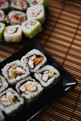 Set of sushi maki with on bamboo background