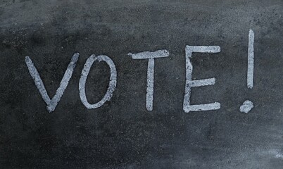 Vote Word Written on Blackboard with Exclamation Mark