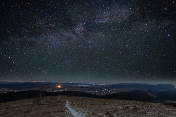 Fototapeta na wymiar Beautiful starry sky in the Ukrainian mountain village