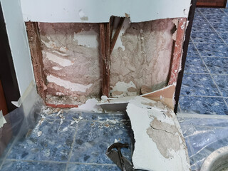 picture of damaged wall in the house because have been eaten by termite
