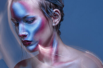 a mystical futuristic portrait of a girl with an experimental neon light. light abstract lines,...