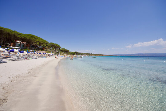 White sand beach and turquoise sea water, le bombarde beach, Alghero, Sardegna, italy 