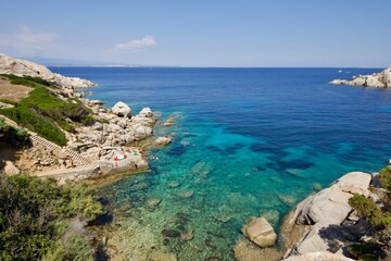 Sardinian coastline with transparent and turquoise sea watercolor, Sardegna, Italy 