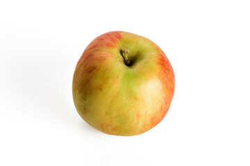 green ripe apple on a white background