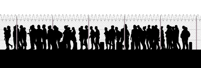 Refugees and immigrants looking for a new life. Column of migrants near the state borders. Fence and barbed wire. Surveillance, supervised. Abandon their lands for a better future. Silhouette