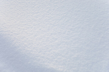 Background of fresh snow texture. Blue tone.