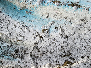 Sea wave. Texture of old blue paint with decay effect. Collapsing art surface. Abstraction since antiquity.