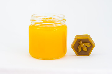 Jar of honey and wax