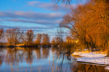 River in winter at evening