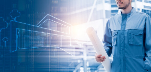 Panoramic banner of Engineer holding blueprint with construction drawing on background, planning for construction project