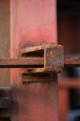 Close up of rusty metal closure device with pal.