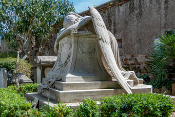 Angel of Grief sculpted by English sculptor William Wetmore Story in the late 19th century for the grave of his wife, Protestant Cemetery in the rione of Testaccio, Rome, Italy