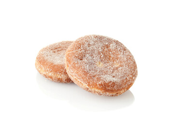 two paczki donuts on white
