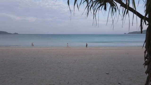 Video 4k Of The Beach With White Sand Beach And Clear Blue Sky In 50fps UHD 4k Video. Patong Beach At Phuket Thailand While Without People In Covid Pandemic