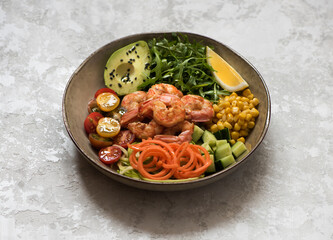 Healhty lunch bowl salad with grilled shrimp, fresh vegetables and herbs. Сlean eating, top view. Balanced food concept.