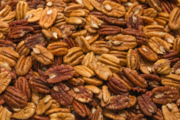 Tasty pecan-nut background. Top view.