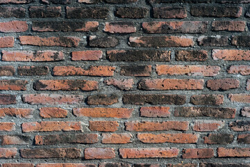 Naklejka premium Old brown brick wall in the Ayutthaya period.