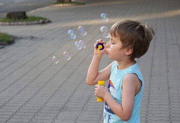 Children play with bubbles