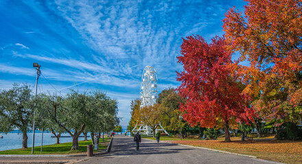 Ferris wheel in Bardolino Harbour, Bardolino on Garda lake, Veneto region, northern Italy - october 29, 2020