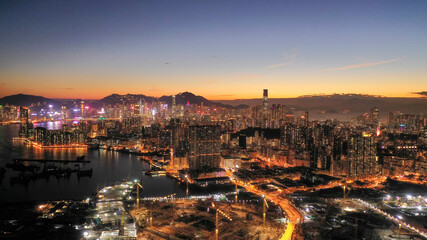 Aerial view of the Kowloon and Hong Kong at sunset 