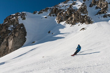 Skiing down the slope, Valmorel, Tarentaise Valley, French Alps