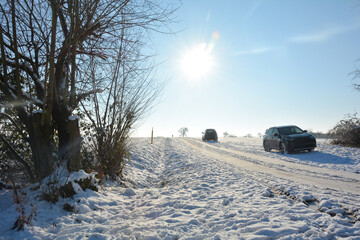 Road with cars in the country, with a lot of snow in winter