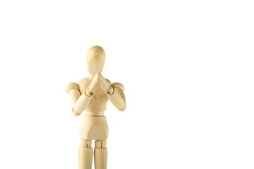 Wooden mannequin folded hands in supplication isolated on white background. Wooden mannequin praying.