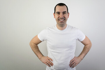 Obraz premium happy smiling young male man stand closeup white background