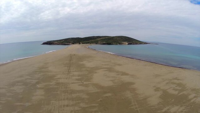 Rhodes Greece: the large sandy  passage from Rhodes to Prasonisi a small uninhabited island in the south with a lighthouse in the summer is a paradise for surfers 