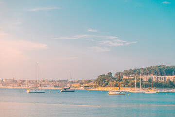 view of sunset in bay with yachts
