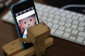 action figure takes a selca