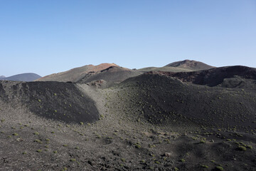 Fototapeta na wymiar Volcanic mountains of fire in Lanzarote, Canary Islands.