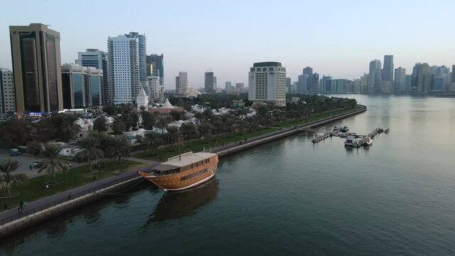 4K aerial shot of Sharjah corniche Khalid Al boom Food Boat