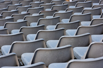 Fototapeta premium Empty grey seats on a seating tribune.