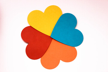 colorful heart shaped papers background for gay chat sites, love message background, top view.
