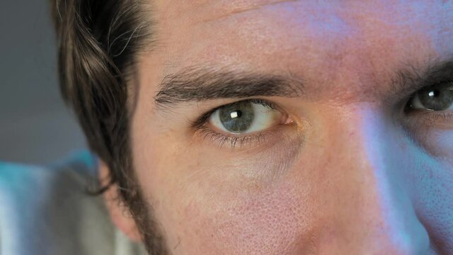 Close up of caucasian man with green eyes