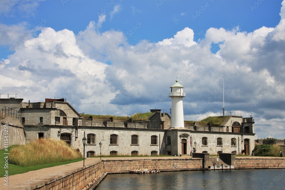 Wall mural lighthouse on an old abandoned building