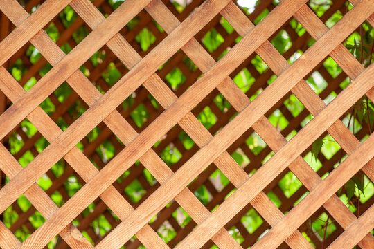 Screen panel made from crossed wooden slats