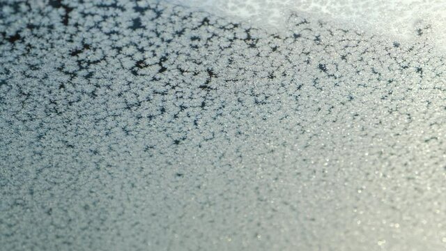 Frozen car glass and frost