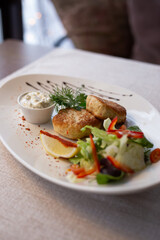 
Fish cakes with salad