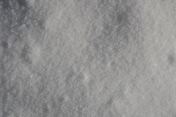 White real snow background. Closeup, top view