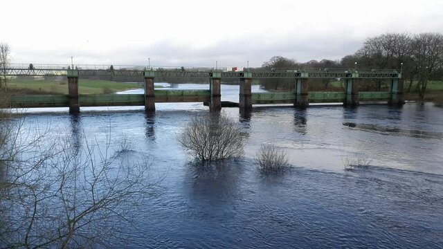 Glenlochar Barrage open on the River Dee, Galloway Hydro Electric Scheme