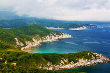 Top view of the coastline of the Sea of Japan with mountains and bays. Far East, Russia