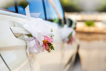 Wedding car decorated with flowers