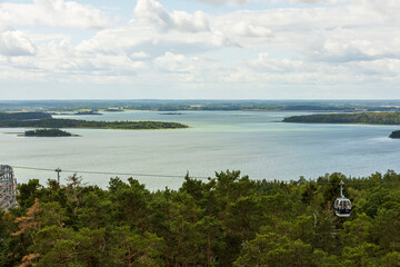Beautiful Baltic sea view with cable car.  Beautiful summer nature backgrounds. Sweden, Europe.