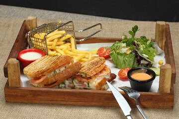 toast with sausage, kashar cheese, and sudjuk served russian salad