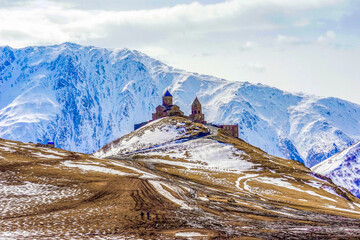 The most beautiful church in Georgia. Gergeti Trinity Church above Kazbegi in the Caucasian Mountains.   © Angela Meier
