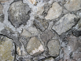 Concrete texture with walled stones. Robust road construction.